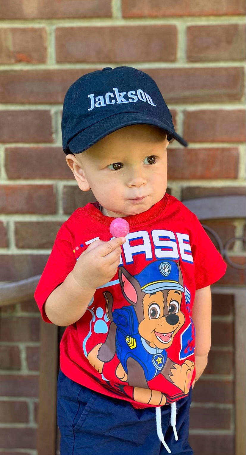 Jackson joined the competition — help win amazing prizes! baby_toddler_clothing, baseball_cap, brick, cap, child, clothing, cool, cricket_cap, electric_blue, fun, happy, headwear, magenta, neck, pattern, person, pink, red, sleeve, t_shirt