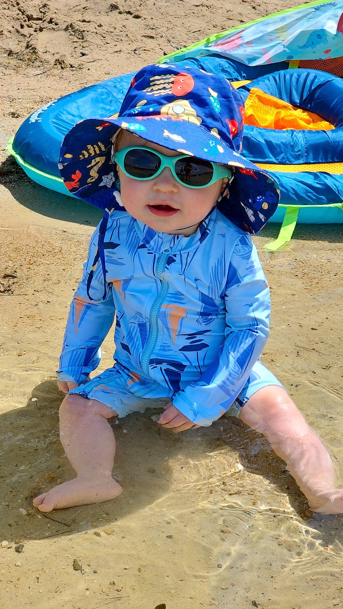 Gaige joined the competition — help win amazing prizes! baby_toddler_clothing, blue, cap, child, electric_blue, eyewear, fun, glasses, goggles, happy, hat, headgear, headwear, leisure, people_in_nature, person, personal_protective_equipment, sand, summer, sun_hat