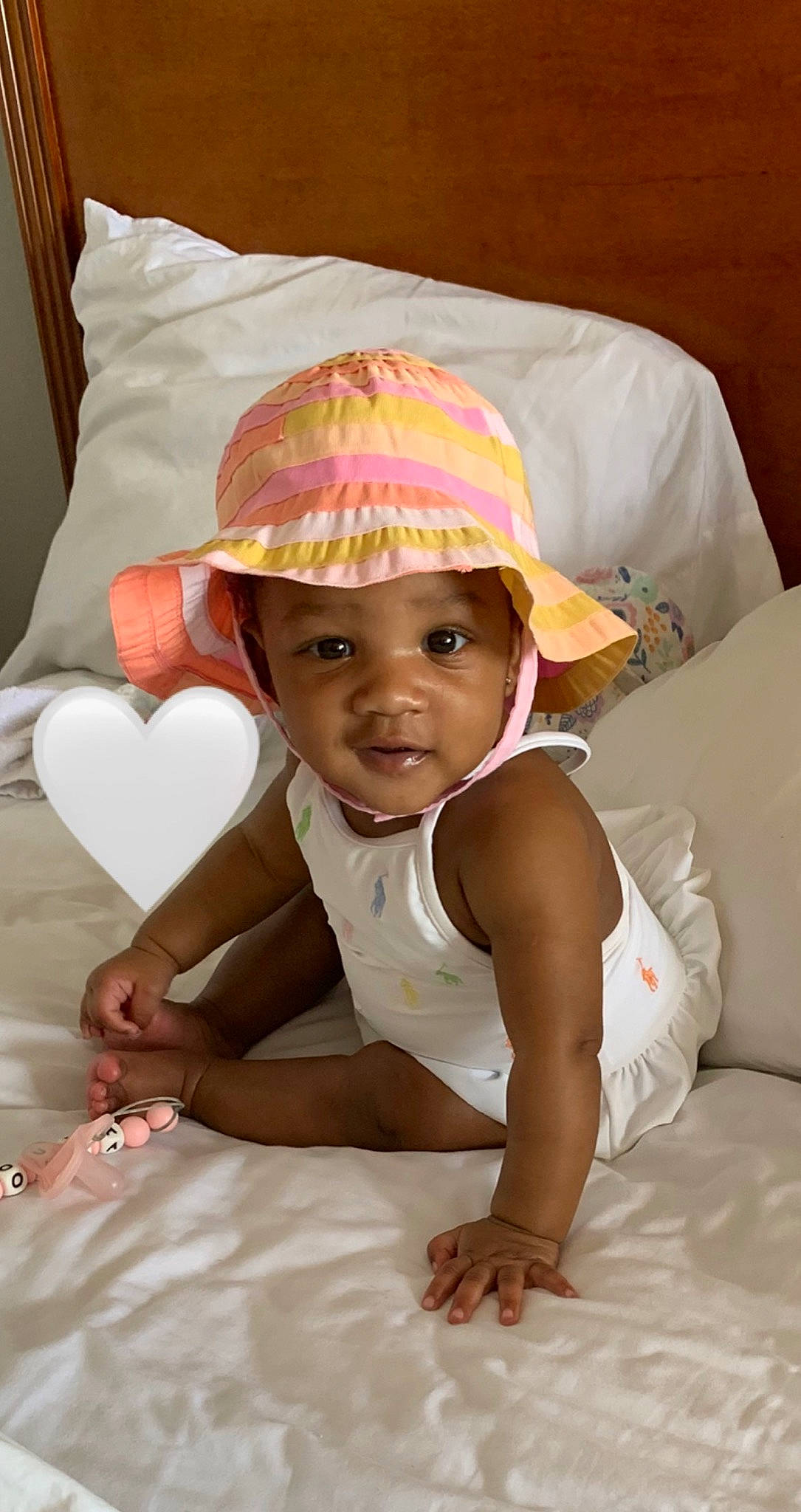 Amoura joined the competition — help win amazing prizes! baby, baby_toddler_clothing, cap, cheek, child, comfort, eye, eyebrow, finger, fun, hairstyle, happy, hat, headwear, linens, lip, person, pink, smile, sun_hat