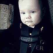 Sonny joined the competition — help win amazing prizes! baby, car_seat, child, closeup, clothing, cute, expression, face, indoor, infant, monochrome, person, portrait, safety_harness, seat, seatbelt, serious, small_hand, straps, young