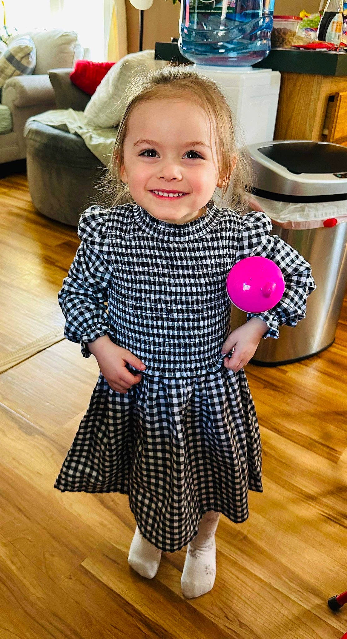 Melody joined the competition — help win amazing prizes! baby_toddler_clothing, child, clothing, dress, electric_blue, facial_expression, floor, flooring, fun, hairstyle, happy, hardwood, joy, kitchen_appliance, pattern, person, play, sleeve, smile, toddler