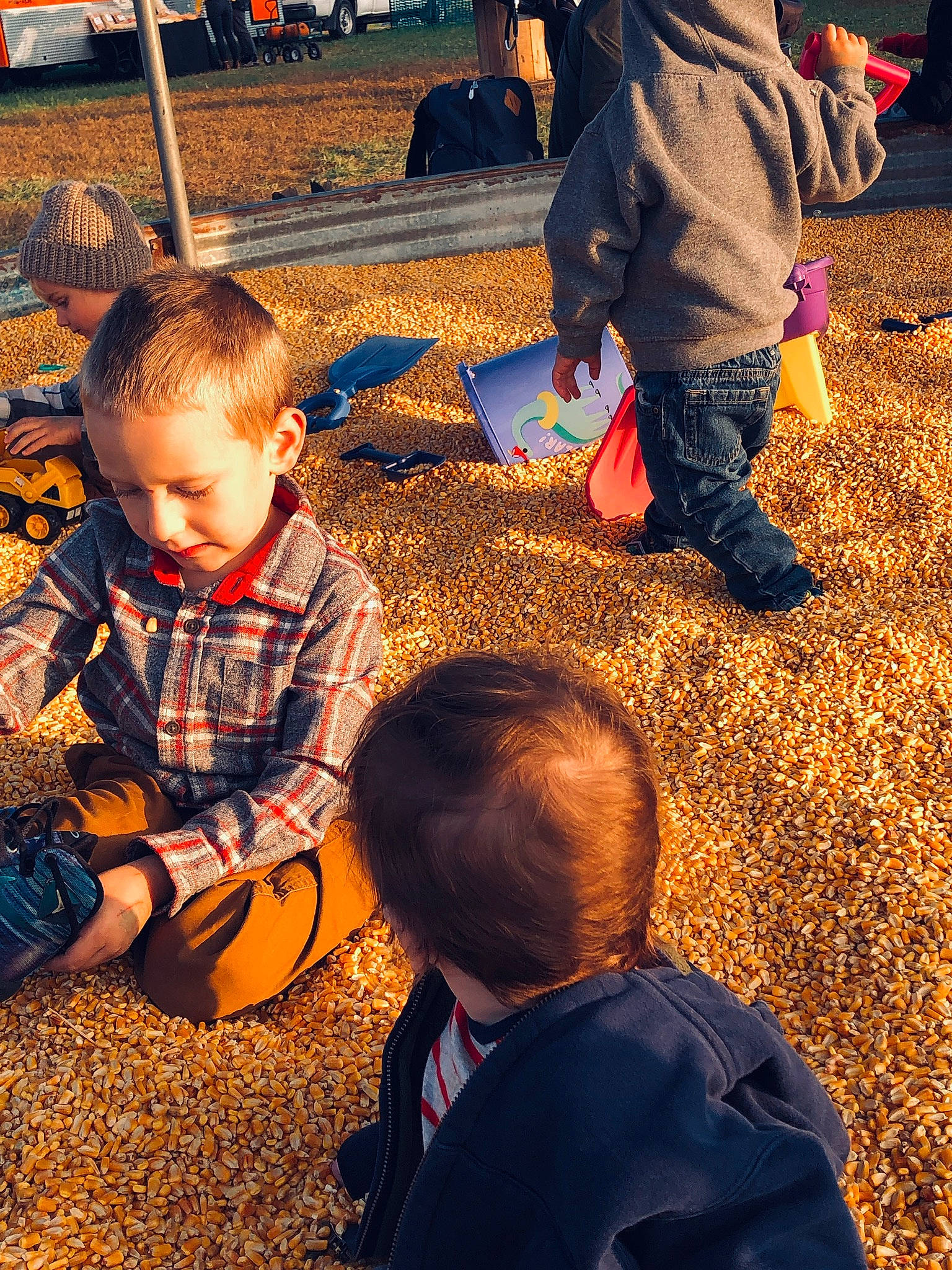 Kaisen is registered to the contest to win money with this photo: adaptation, child, fun, grass, guitar, happy, leisure, morning, musical_instrument, orange, people_in_nature, person, photograph, sharing, shoe, sitting, snapshot, soil, toddler, tree