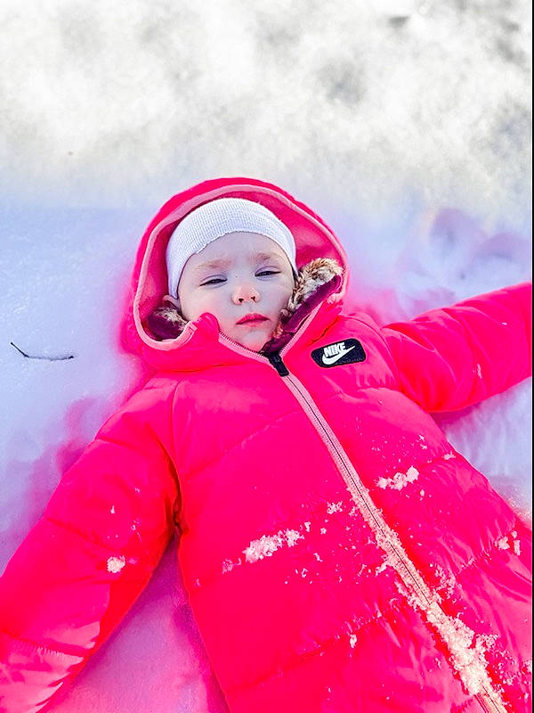Fiona joined the competition — help win amazing prizes! event, face, fun, glove, happy, headwear, hood, jacket, leisure, magenta, parka, people_in_nature, person, personal_protective_equipment, pink, recreation, sleeve, toddler, tradition, tree