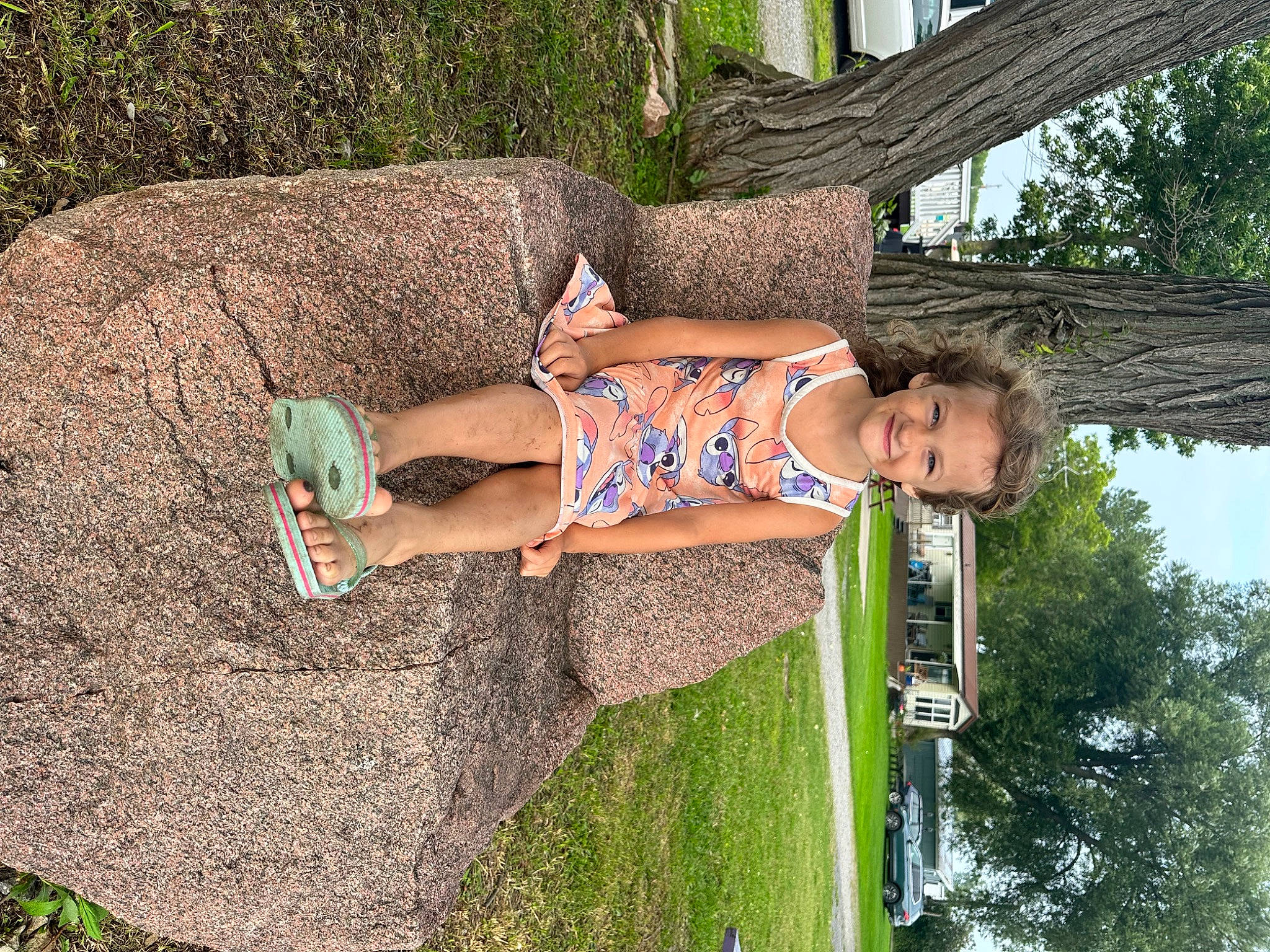 Genevieve is registered to the contest to win money with this photo: day_dress, dress, fun, grass, green, happy, human_leg, joy, knee, landscape, leisure, people_in_nature, person, plant, sandal, sky, summer, thigh, tree, vacation