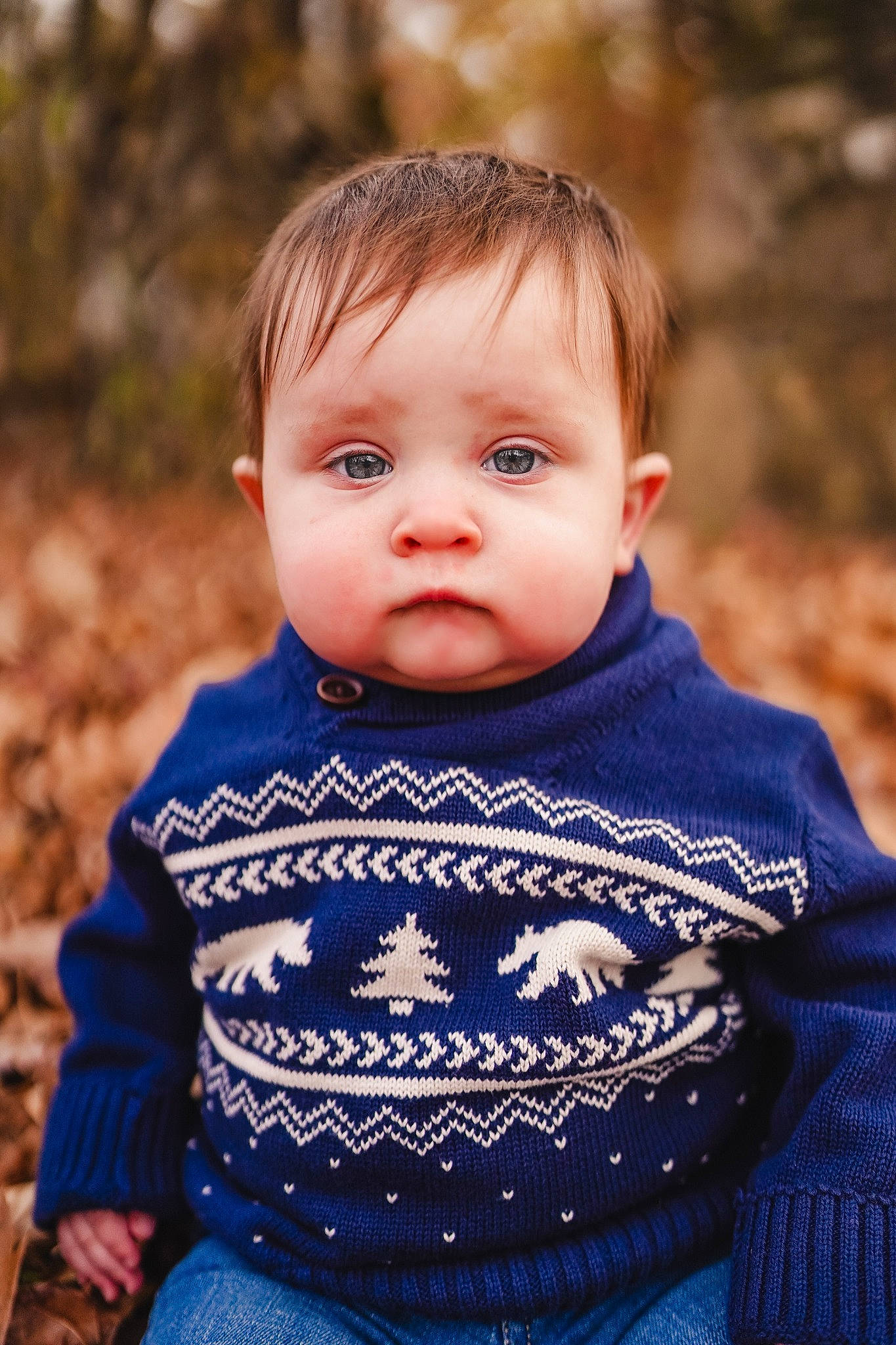 Asher is registered to the contest to win money with this photo: baby, baby_toddler_clothing, cheek, chin, close_up, electric_blue, eye, flash_photography, grass, happy, iris, leaf, lip, nose, outerwear, person, skin, sleeve, toddler, wood
