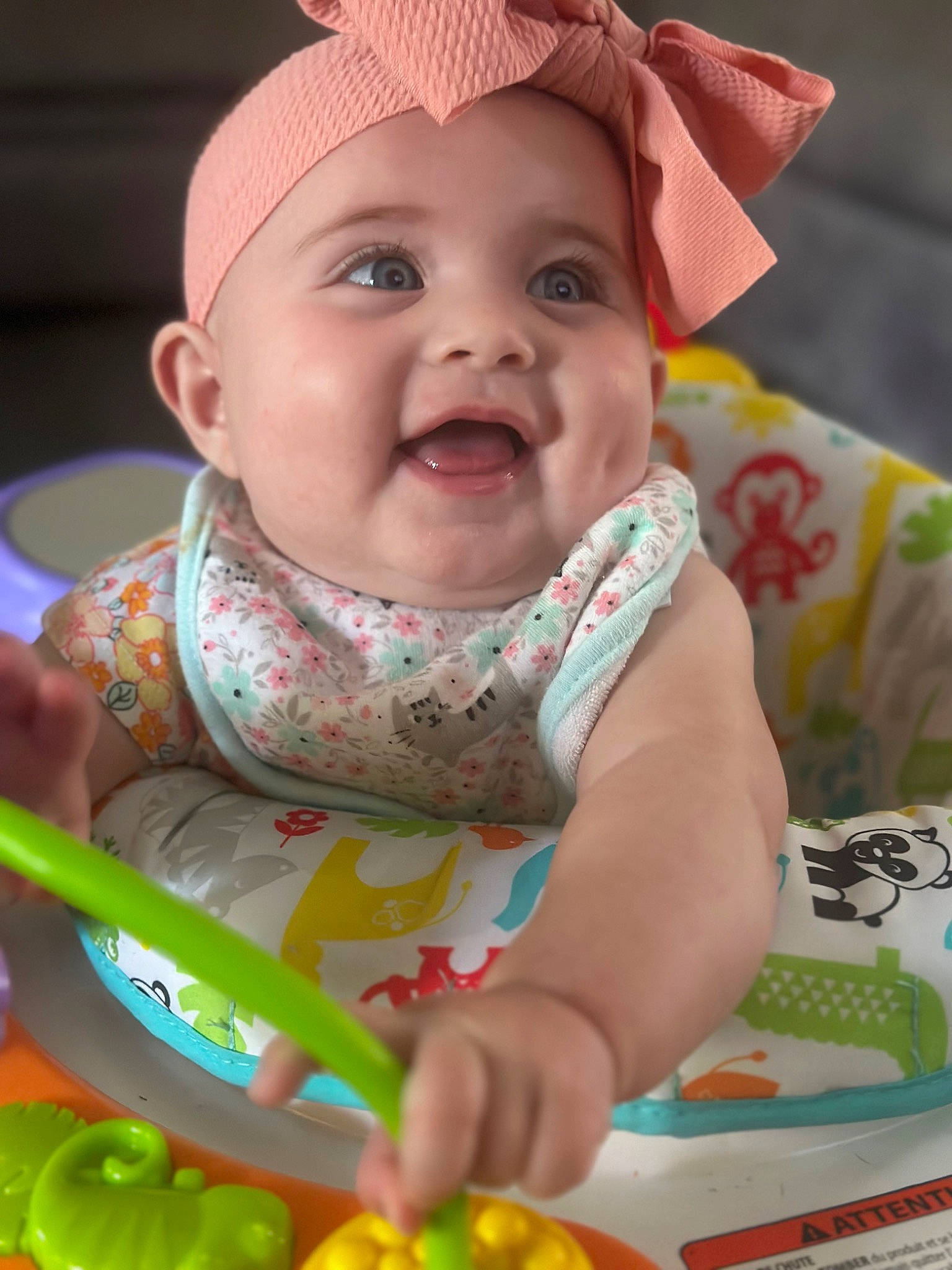 Everleigh is registered to the contest to win money with this photo: baby, baby_products, baby_toddler_clothing, cap, cheek, child, costume_hat, event, face, facial_expression, fashion_accessory, fun, grass, green, happy, person, product, skin, smile, sweetness