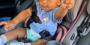 Kennedi is registered to the contest to win money with this photo: baby, bodypart, car, car_interior, carseat, clothing, cushion, face, finger, hand, happy, head, homedecor, person, photography, portrait, sitting, smile, transportation, vehicle