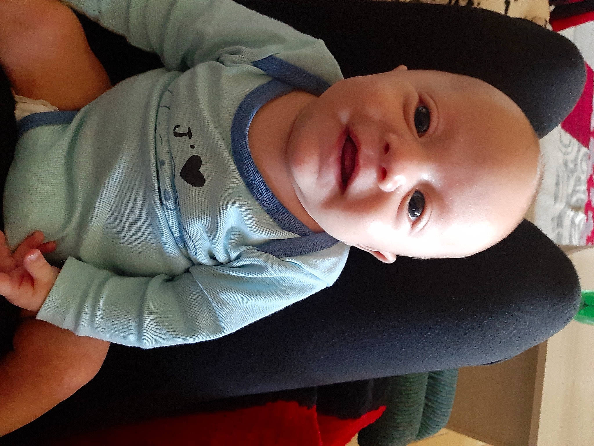 Hayden participe au concours pour gagner de l'argent avec cette photo : baby, baby_products, baby_toddler_clothing, cap, cheek, child, comfort, cool, elbow, finger, hat, human_body, lip, mouth, nose, person, plant, skin, sleeve, toddler