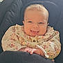 Bonnie joined the competition — help win amazing prizes! baby, smiling, infant, face, cute, child, clothing, floral, sitting, seat, cushion, happy, portrait, indoor, young_child, cute_outfit, hands, baby_girl, soft_lighting, closeup