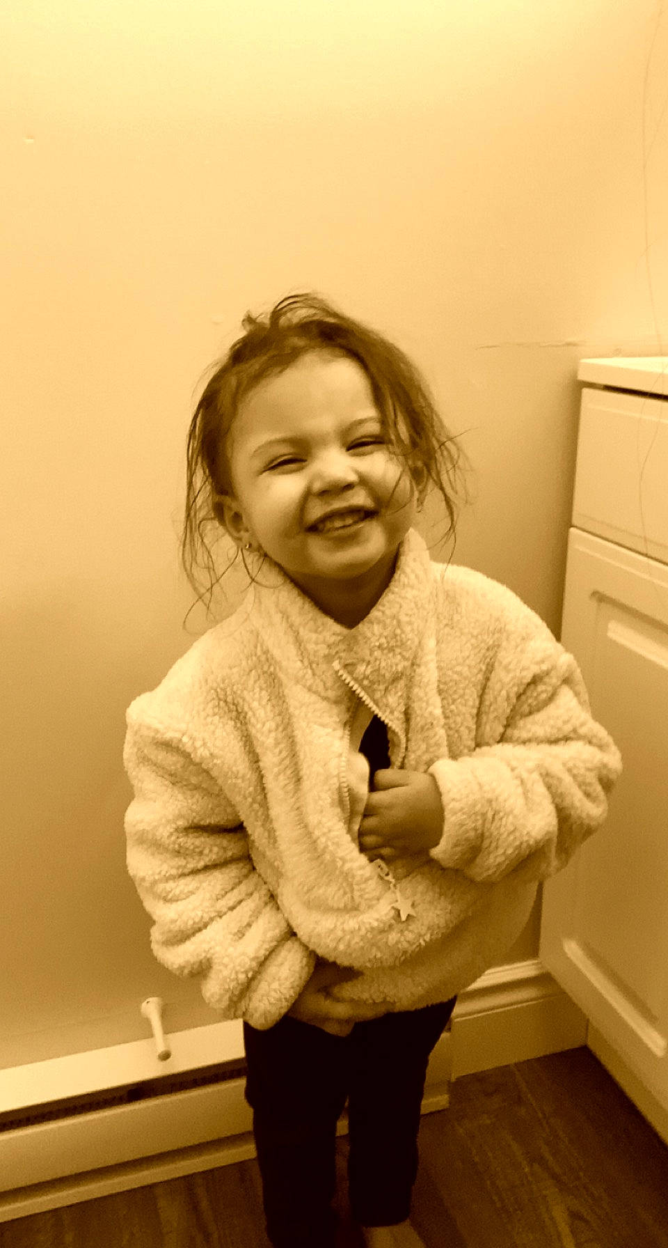 Adalynn is registered to the contest to win money with this photo: cabinetry, cheek, drawer, eye, facial_expression, fun, gesture, hair, happy, head, iris, joy, monochrome, monochrome_photography, mouth, nose, person, shoulder, sleeve, smile