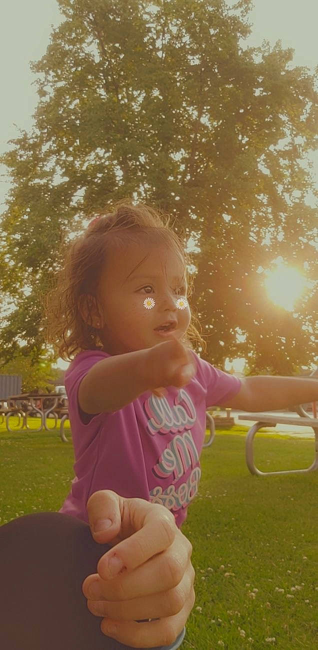 Adalynn is registered to the contest to win money with this photo: baby, baby_toddler_clothing, child, facial_expression, finger, fun, gesture, grass, hand, happy, leaf, leisure, people_in_nature, person, plant, sky, standing, summer, tints_and_shades, toddler