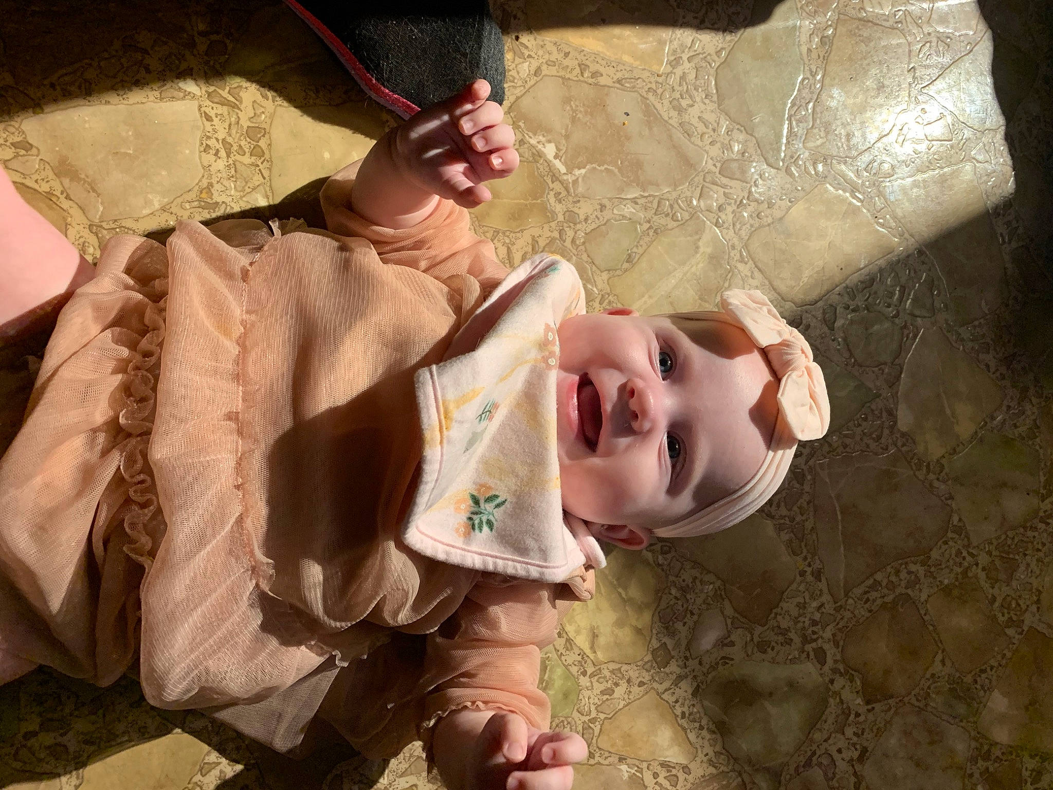 Karlee is registered to the contest to win money with this photo: baby, baby_toddler_clothing, cheek, chin, eye, face, flesh, flooring, fun, gesture, happy, head, human_body, mouth, nose, person, play, skin, smile, toddler