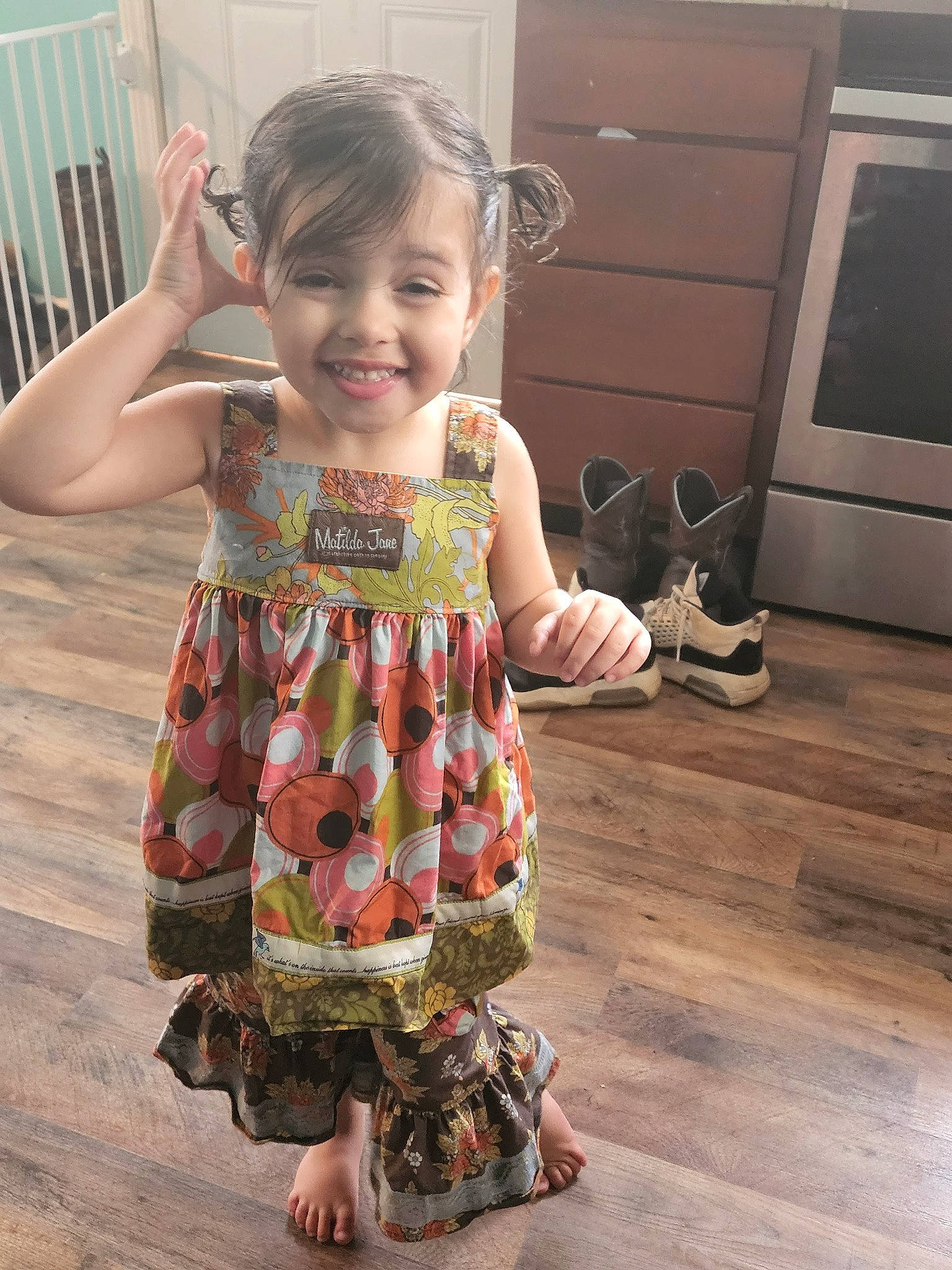 Angela joined the competition — help win amazing prizes! baby_toddler_clothing, cabinetry, child, day_dress, dress, flooring, hair, happy, hardwood, head, joint, joy, leg, person, skin, sleeve, smile, standing, television, toddler