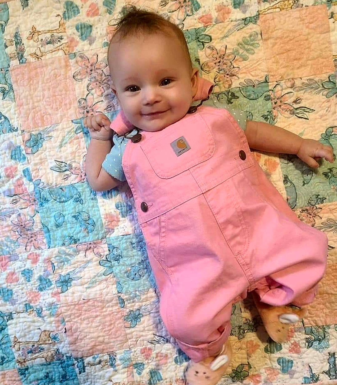 Rowyn is registered to the contest to win money with this photo: baby, baby_toddler_clothing, cheek, child, dress, face, flooring, fun, grass, happy, joy, nose, pattern, person, pink, skin, sleeve, smile, t_shirt, textile