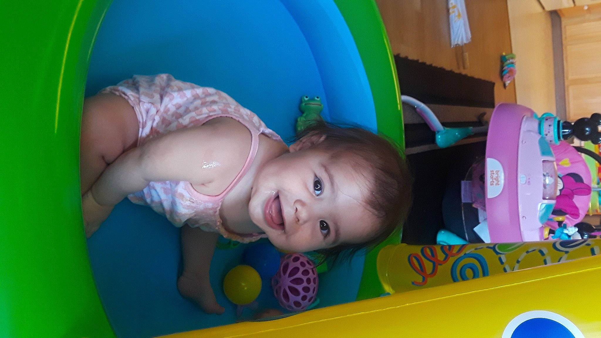 Jazzlyn is registered to the contest to win money with this photo: baby, baby_playing_with_toys, child, flooring, fun, happy, human_body, iris, joy, leisure, mouth, organ, person, photograph, product, purple, recreation, skin, smile, snapshot