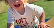 Waylon joined the competition — help win amazing prizes! blond_hair, bokeh, candid, child, grass, hands, happy, joy, laughing, outdoors, play, playground, portrait, shallow_depth_of_field, skin, slide, smiling, sunny, toddler, white_shirt