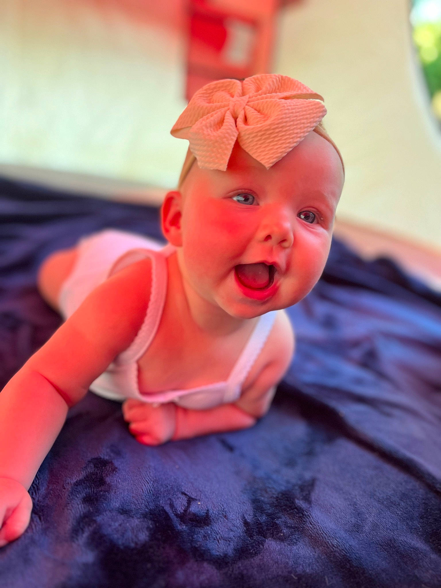 Kayzlee joined the competition — help win amazing prizes! baby, baby_toddler_clothing, cap, carmine, child, fashion_accessory, flesh, flooring, fun, happy, hat, headwear, magenta, nail, peach, person, pink, sitting, smile, sweetness