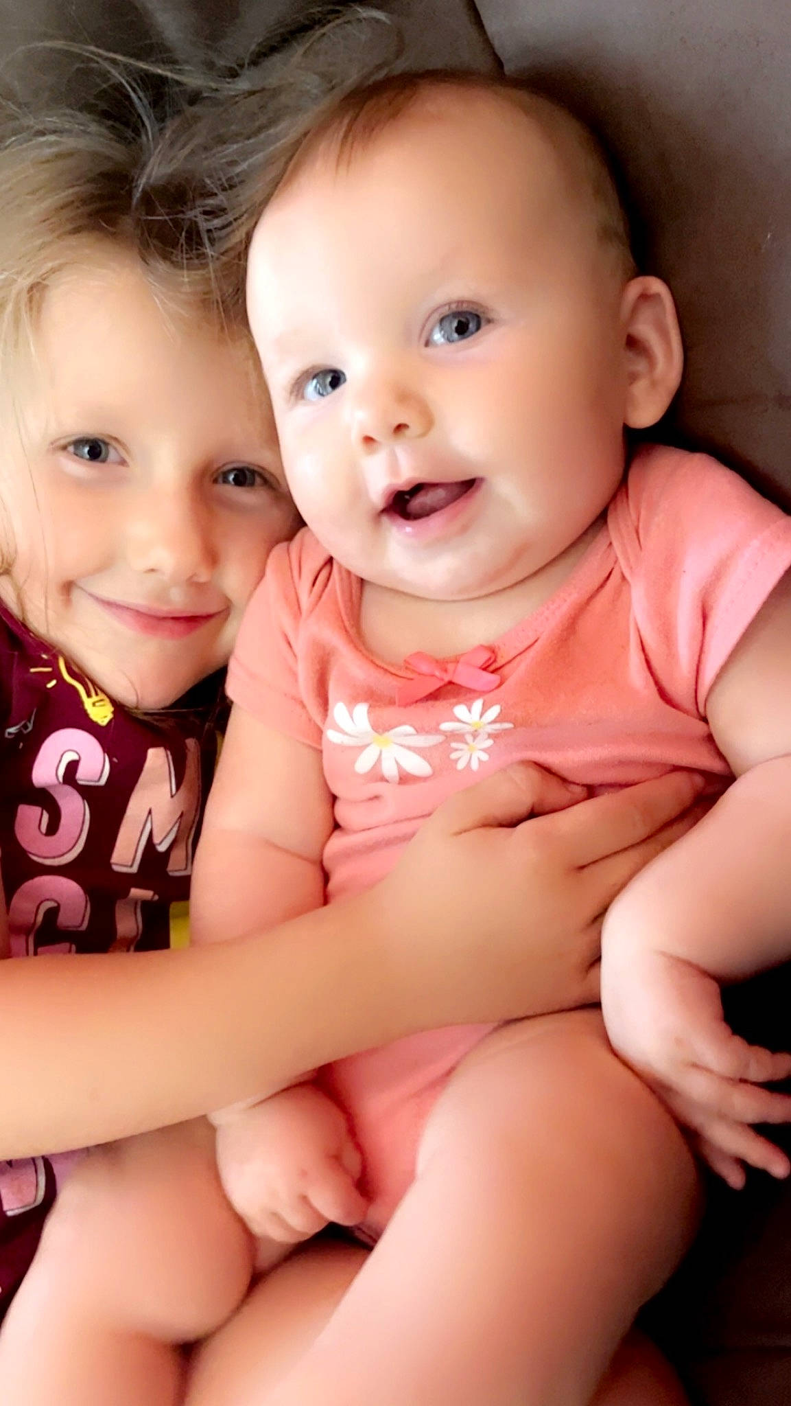 Kynzee is registered to the contest to win money with this photo: baby_toddler_clothing, cheek, eye, flash_photography, gesture, happy, human, human_body, iris, joy, lip, mouth, muscle, neck, nose, organ, person, pink, skin, smile