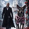 Kona is registered to the contest to win money with this photo: man, dog, full_moon, castle, roses, night, clouds, walking, coat, gloves, leopard_print, sweater, pathway, fantasy, dramatic, portrait, flowers, large_dog, fashion, mystical