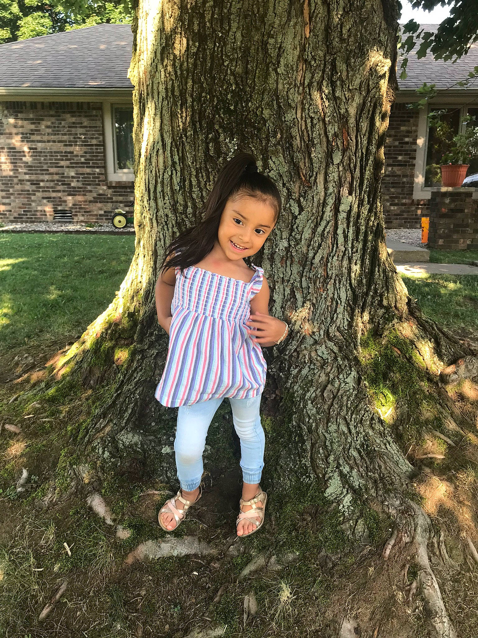 Ailani is registered to the contest to win money with this photo: adaptation, botany, branch, forest, grass, grass_family, happy, joy, leaf, leisure, nature, people_in_nature, person, plant, standing, tints_and_shades, toddler, tree, trunk, waist