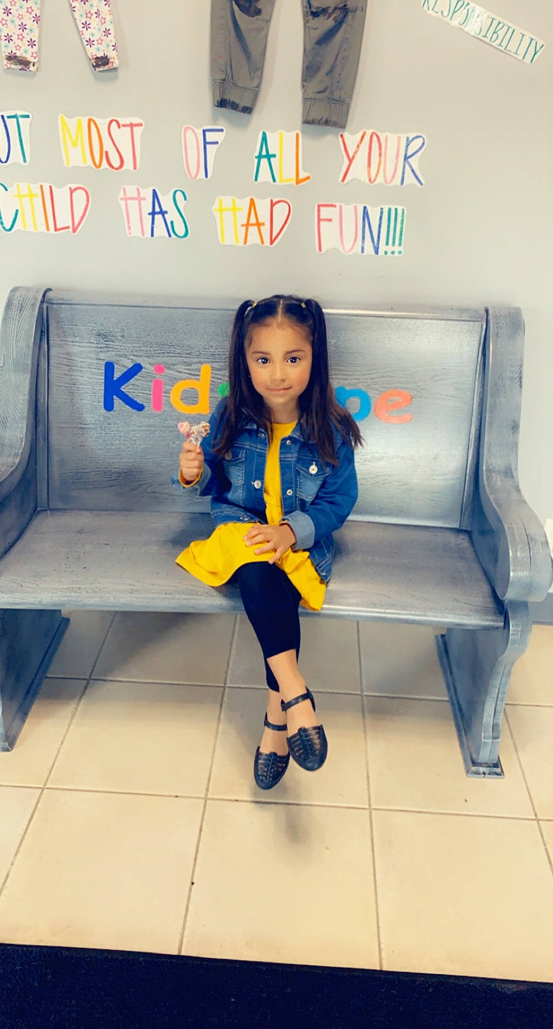Ailani joined the competition — help win amazing prizes! child, couch, denim, dress, electric_blue, fashion_design, floor, flooring, hair, hairstyle, happy, human_leg, joy, knee, leg, leisure, line, person, sitting, sock