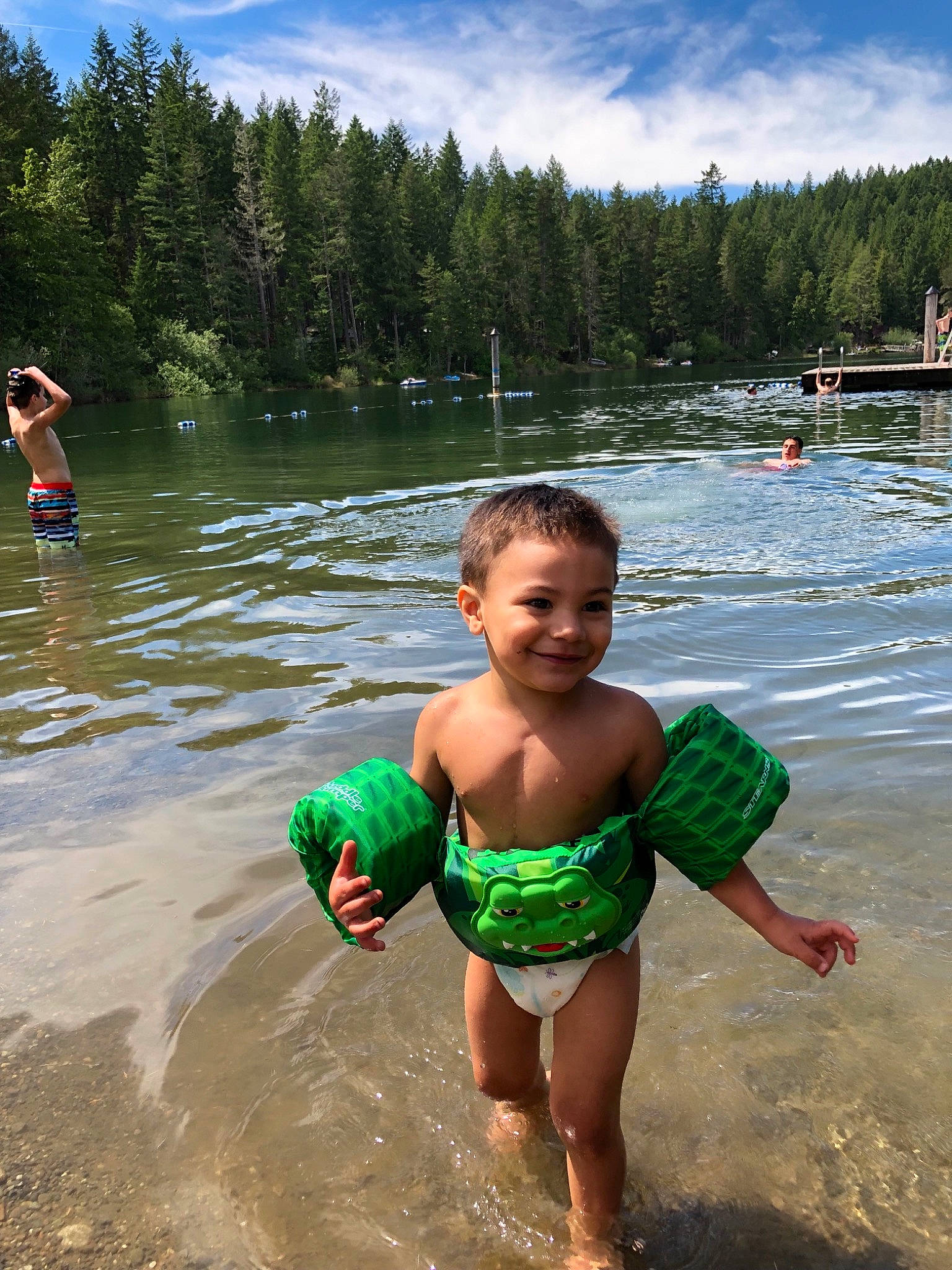 Malaki is registered to the contest to win money with this photo: bathing, beach, child, fun, happy, holiday, joy, lake, leisure, person, personal_protective_equipment, play, recreation, river, smile, summer, swimming, toddler, tourism, vacation