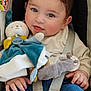 baby, child, blue_eyes, car_seat, plush_toy, soft_toy, smiling, rosy_cheeks, clothing, seatbelt, infant, cute, portrait, hands, jeans, comfort, indoor, closeup, happy, sitting