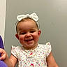 toddler, child, smiling, headband, bow, polka_dot, dress, happy, indoor, portrait, cute, person, baby, face, skin, cheeks, young, standing, holding, colorful