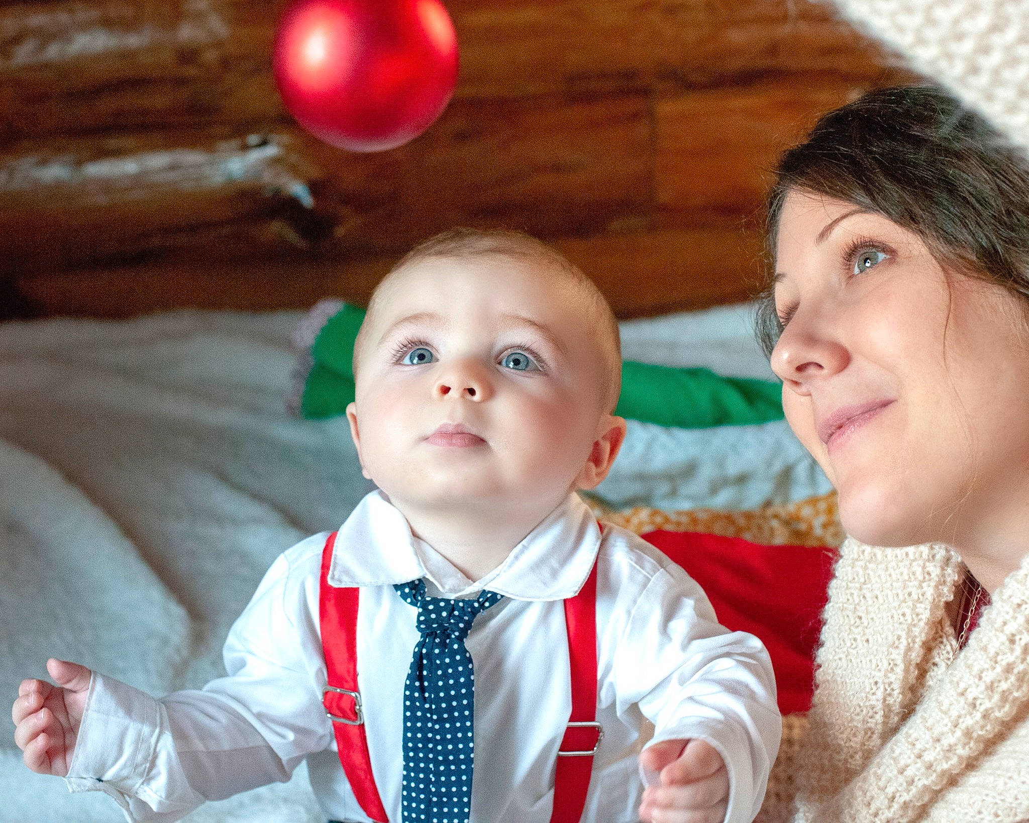 Richie is registered to the contest to win money with this photo: boy, child, christmas, facial_expression, fun, girl, happiness, infant, people, person, product, red, skin, smile, toddler, tradition