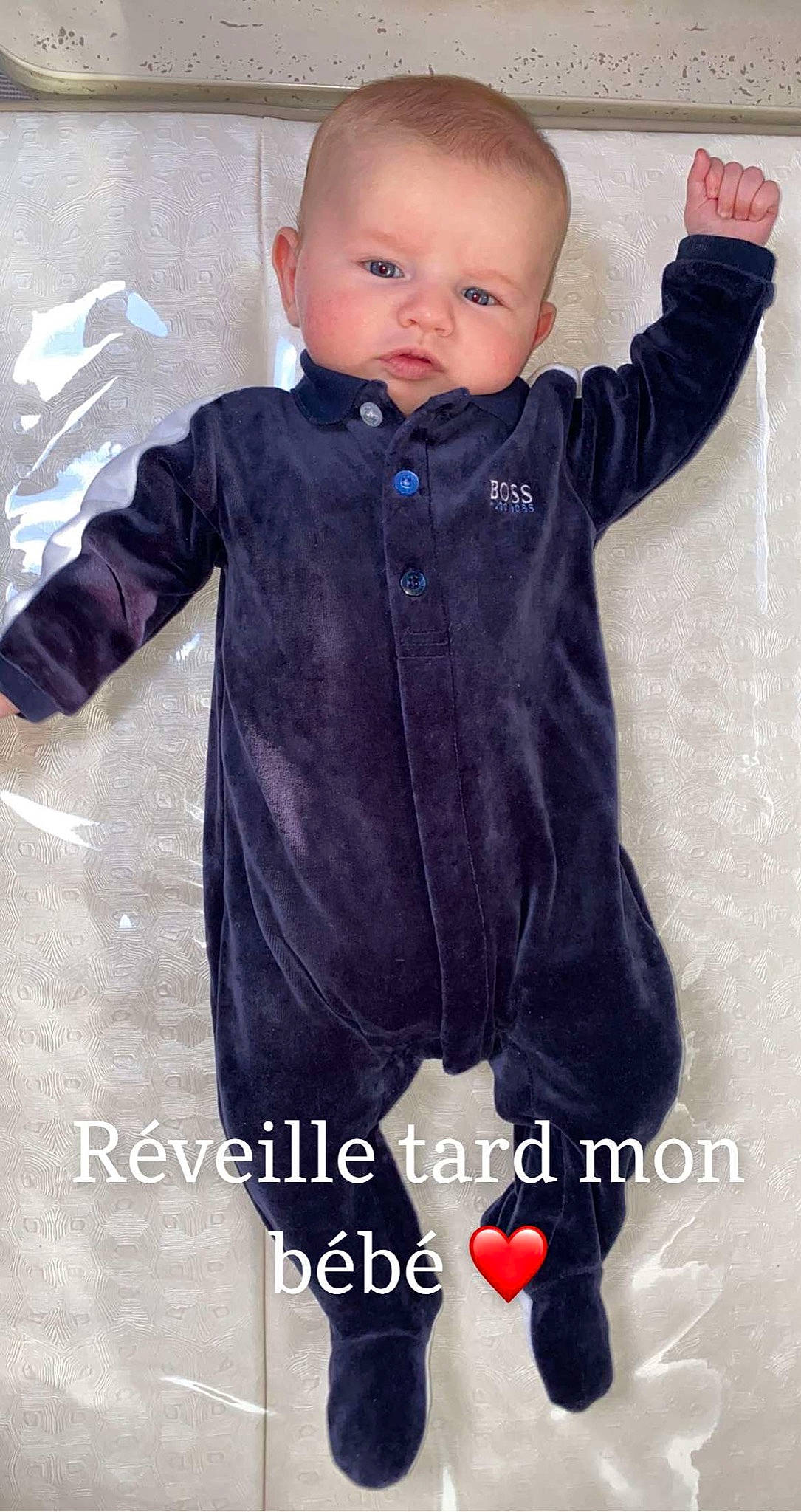 Elyas participe au concours pour gagner de l'argent avec cette photo : baby, baby_toddler_clothing, child, collar, electric_blue, eye, fashion_design, formal_wear, gesture, happy, magenta, outerwear, pattern, person, personal_protective_equipment, sleeve, thumb, toddler
