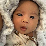 Hadrien participe au concours pour gagner de l'argent avec cette photo : baby, infant, face, blanket, cozy, wrapped, wide_eyes, curious, cute, soft_texture, warm, close_up, child, newborn, expression, indoors, comfort, sleepwear, adorable, portrait