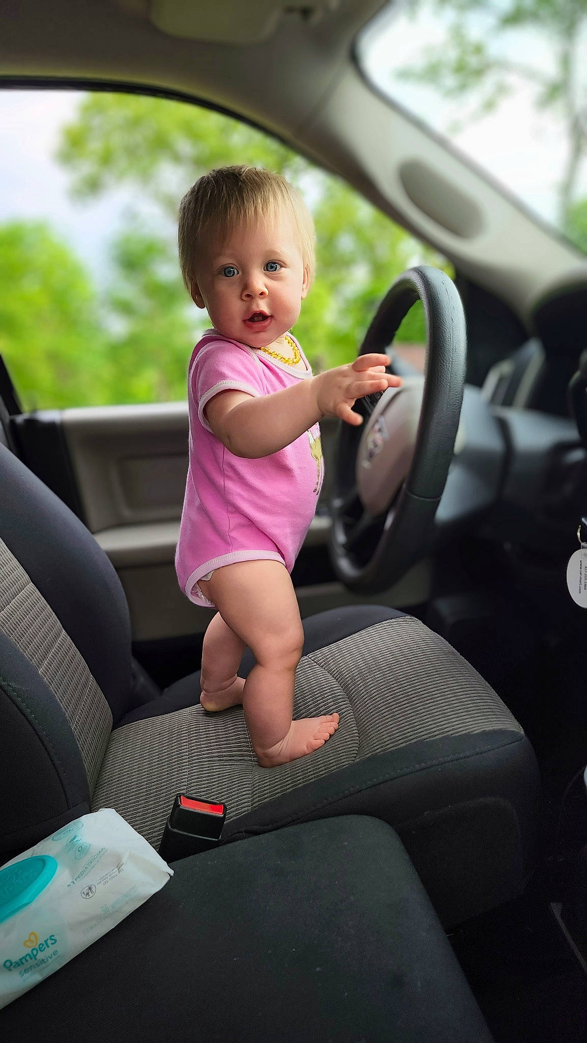 Kyla joined the competition — help win amazing prizes! auto_part, automotive_design, automotive_exterior, automotive_mirror, baby, baby_toddler_clothing, car, car_seat, car_seat_cover, child, finger, hand, mammal, mode_of_transport, motor_vehicle, person, steering_part, steering_wheel, toddler, vehicle