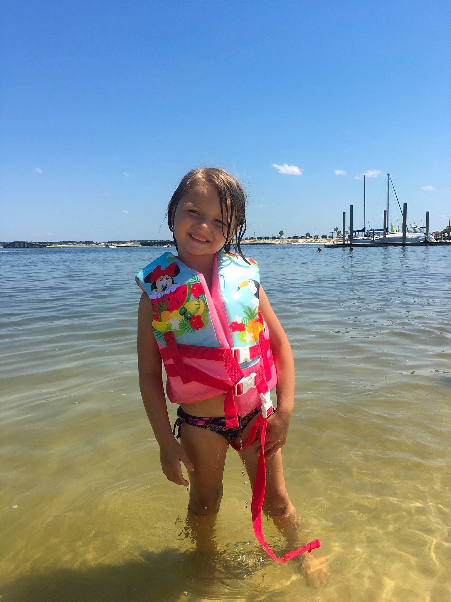 Kinsley joined the competition — help win amazing prizes! beach, child, coast, fun, happy, holiday, joy, leisure, lifejacket, ocean, person, personal_protective_equipment, pink, recreation, sea, sky, summer, toddler, tourism, vacation