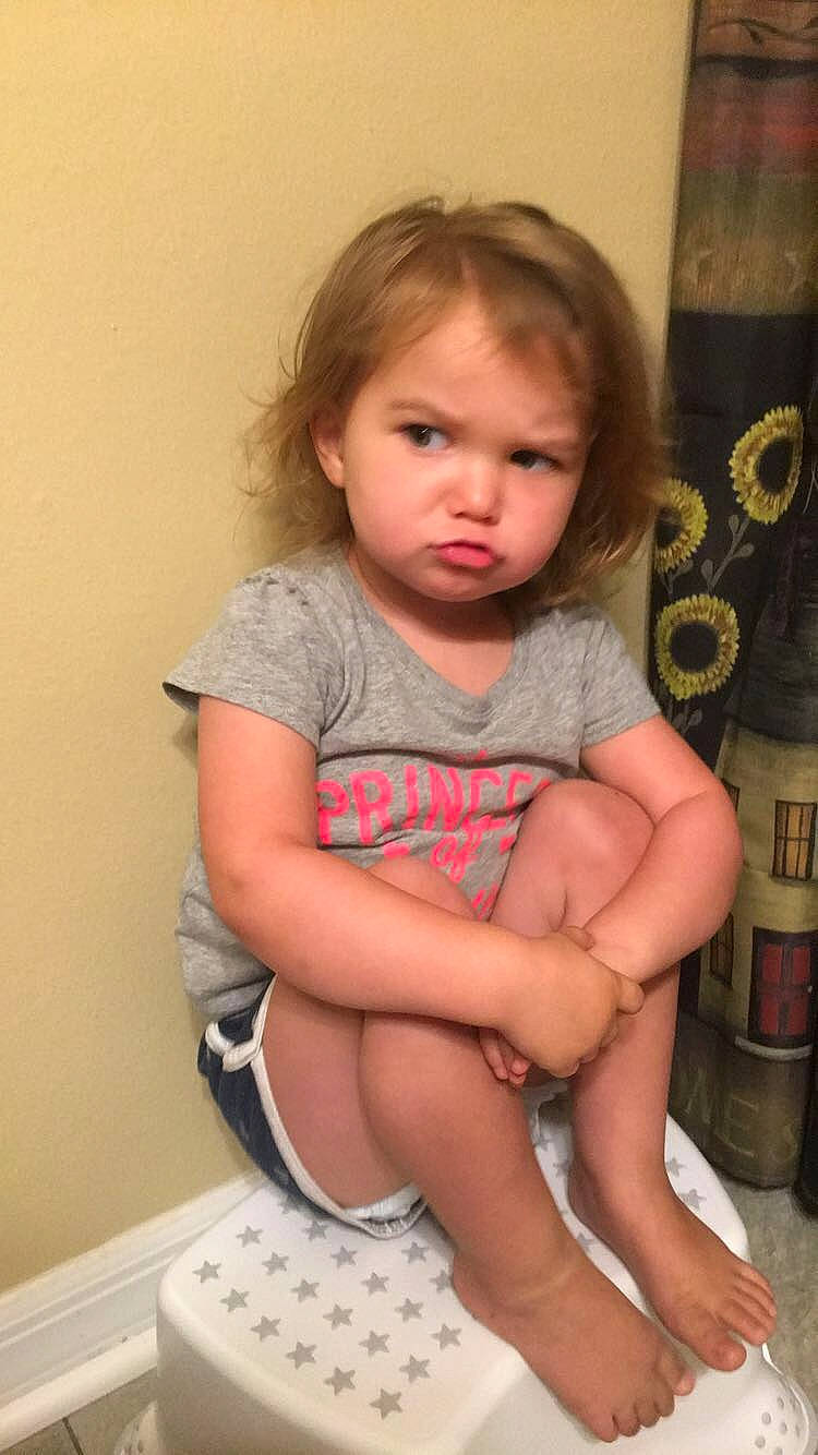 Sophie is registered to the contest to win money with this photo: arm, baby, cheek, child, finger, human_leg, leg, person, sitting, skin, thigh, thumb, toddler