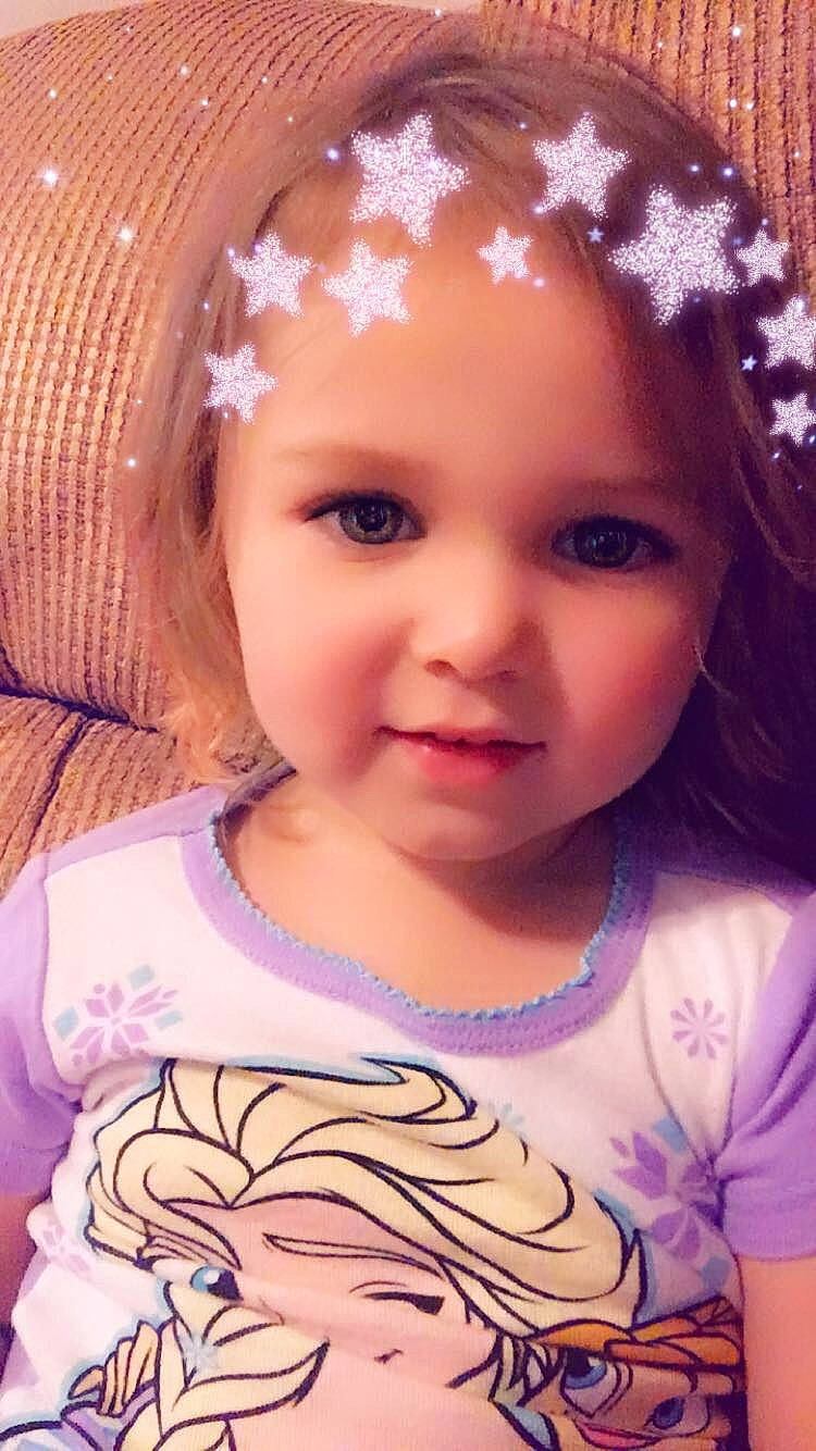 Sophie is registered to the contest to win money with this photo: beauty, cheek, child, chin, eye, eyebrow, face, facial_expression, forehead, hair, hair_accessory, head, headgear, lip, nose, person, pink, purple, skin, smile