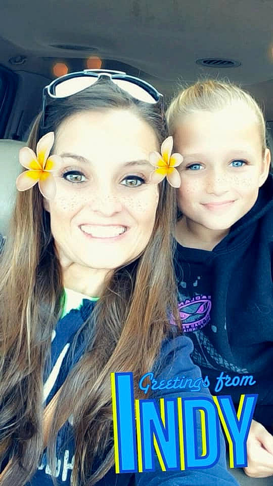 Chloe is registered to the contest to win money with this photo: blond, child, ear, eye, face, flower, fun, hair, happy, head, iris, joy, long_hair, person, photo_caption, photography, plant, product, selfie, sibling