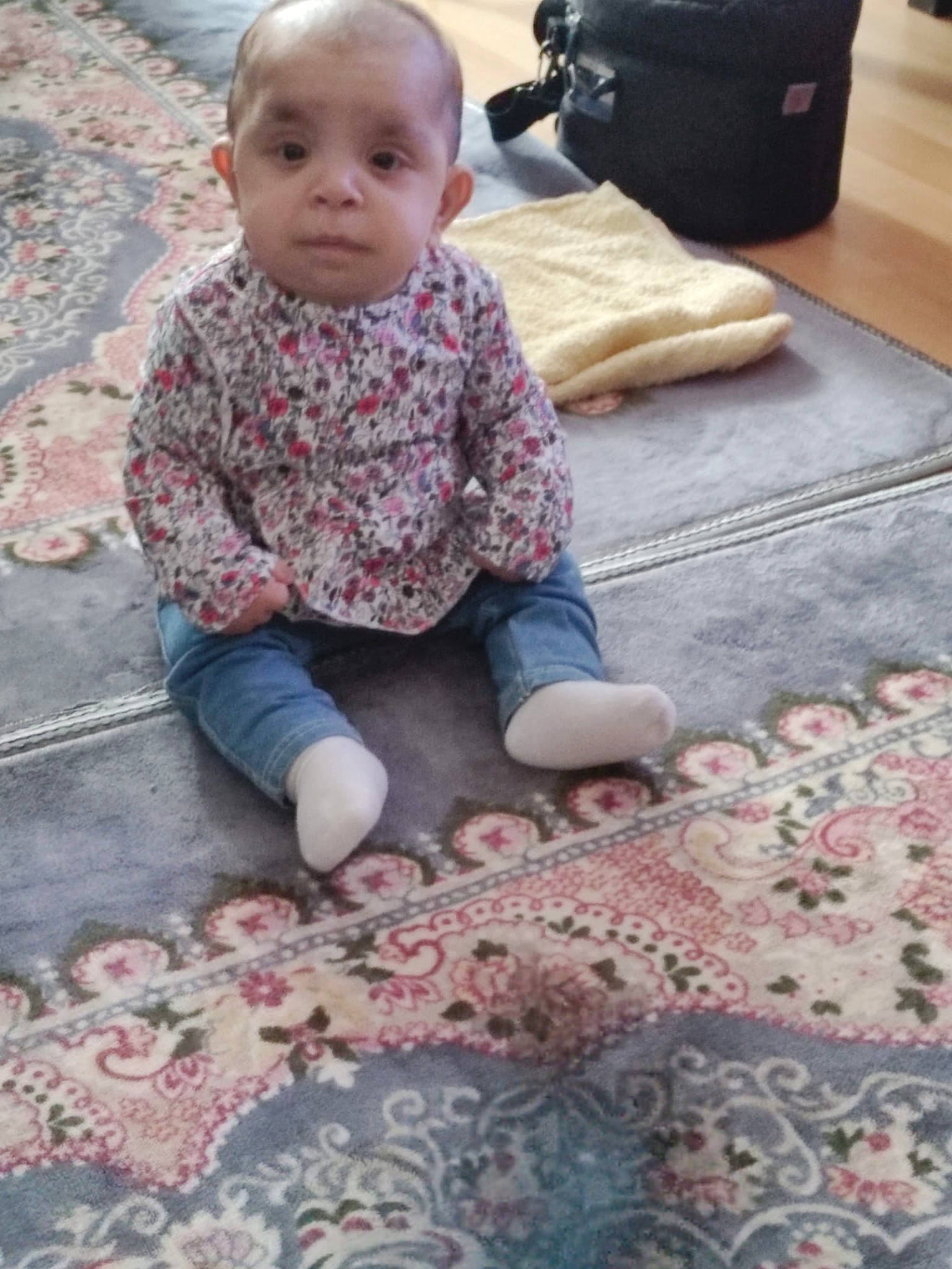 Janna participe au concours pour gagner de l'argent avec cette photo : baby, baby_toddler_clothing, blue, cheek, child, comfort, face, floor, flooring, mammal, pattern, person, photograph, product, skin, sleeve, snapshot, textile, toddler, vertebrate