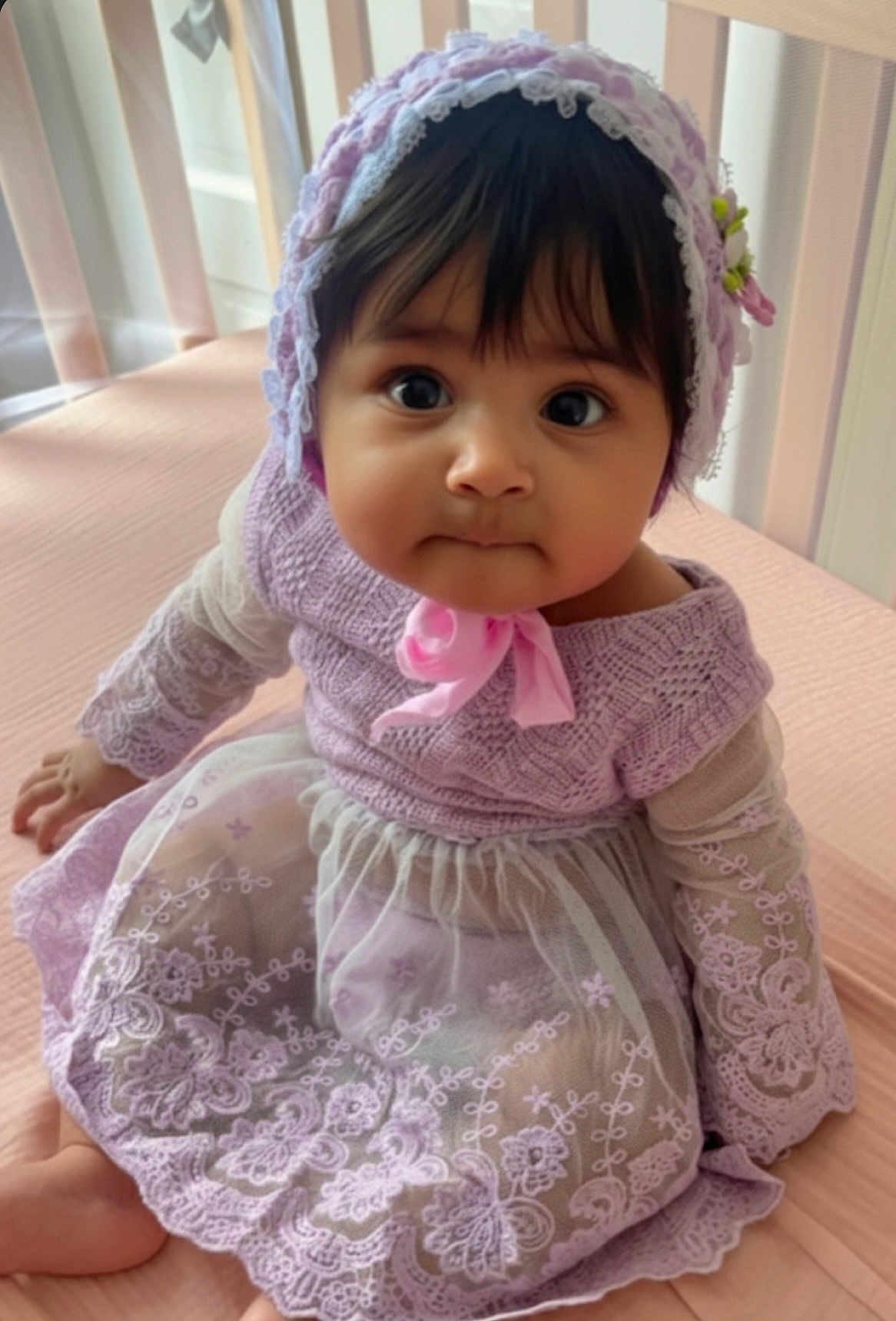Maëlys joined the competition — help win amazing prizes! baby, child, infant, dress, lace, bonnet, pink, purple, sitting, cute, portrait, indoors, soft_light, face, hands, feet, curious, young, person, adorable