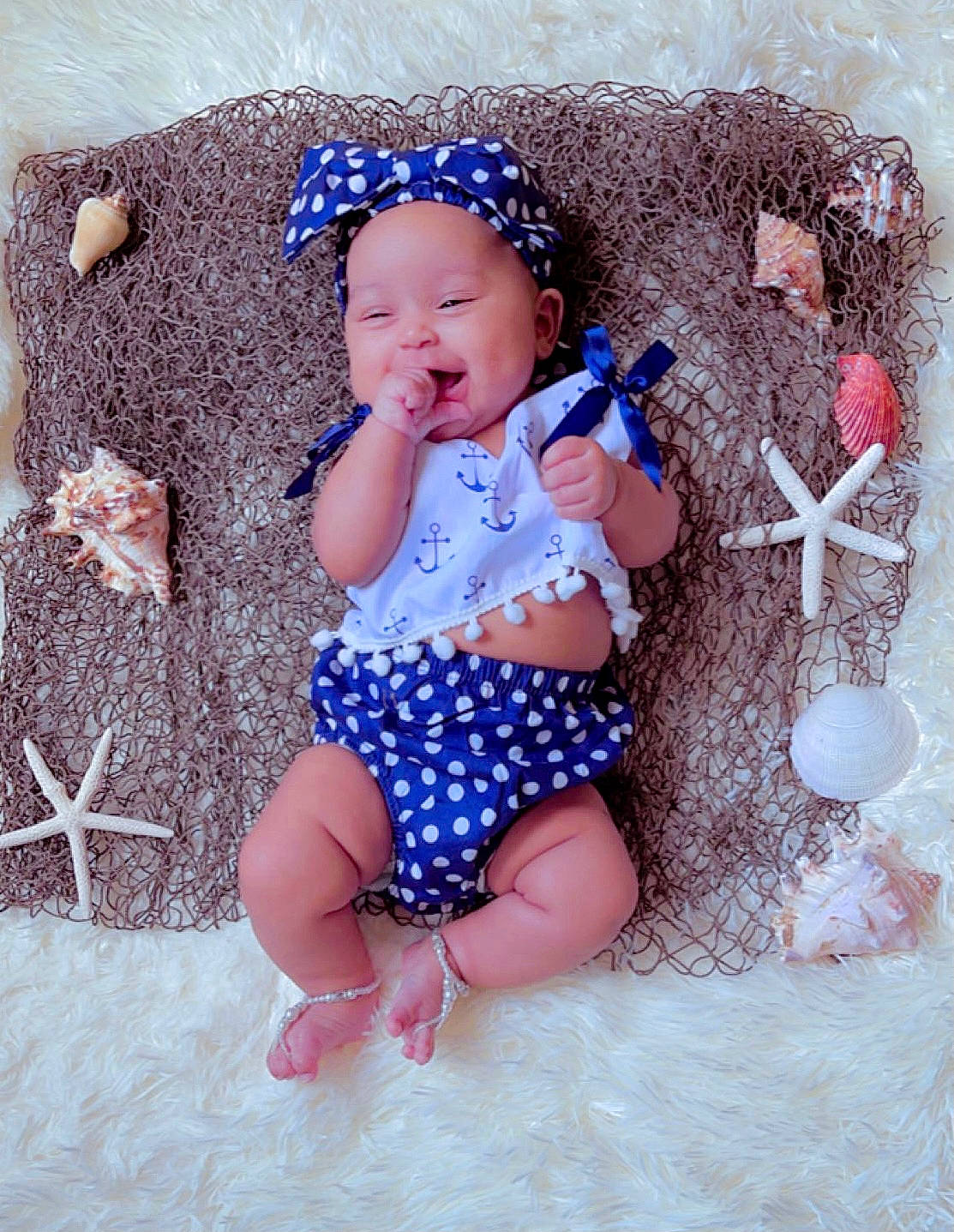 Ainara Sophia is registered to the contest to win money with this photo: baby, baby_products, baby_toddler_clothing, child, comfort, electric_blue, face, finger, fun, hat, headgear, headwear, pattern, person, pink, purple, skin, sleeve, smile, textile