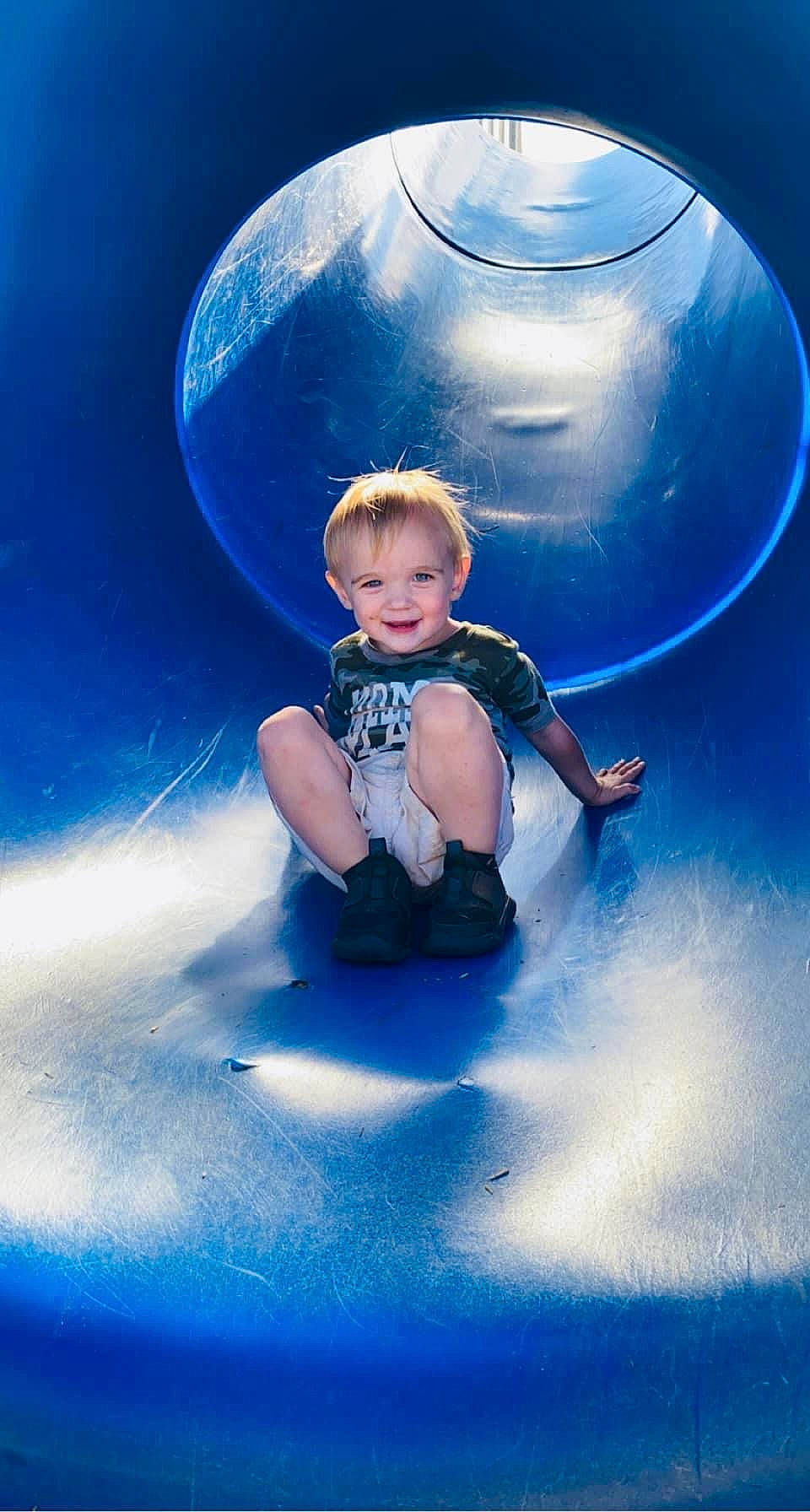Wyatt is registered to the contest to win money with this photo: aqua, azure, baby, baby_toddler_clothing, blue, child, circle, electric_blue, flash_photography, fun, graphics, happy, joy, leisure, people_in_nature, person, recreation, sky, symmetry, toddler