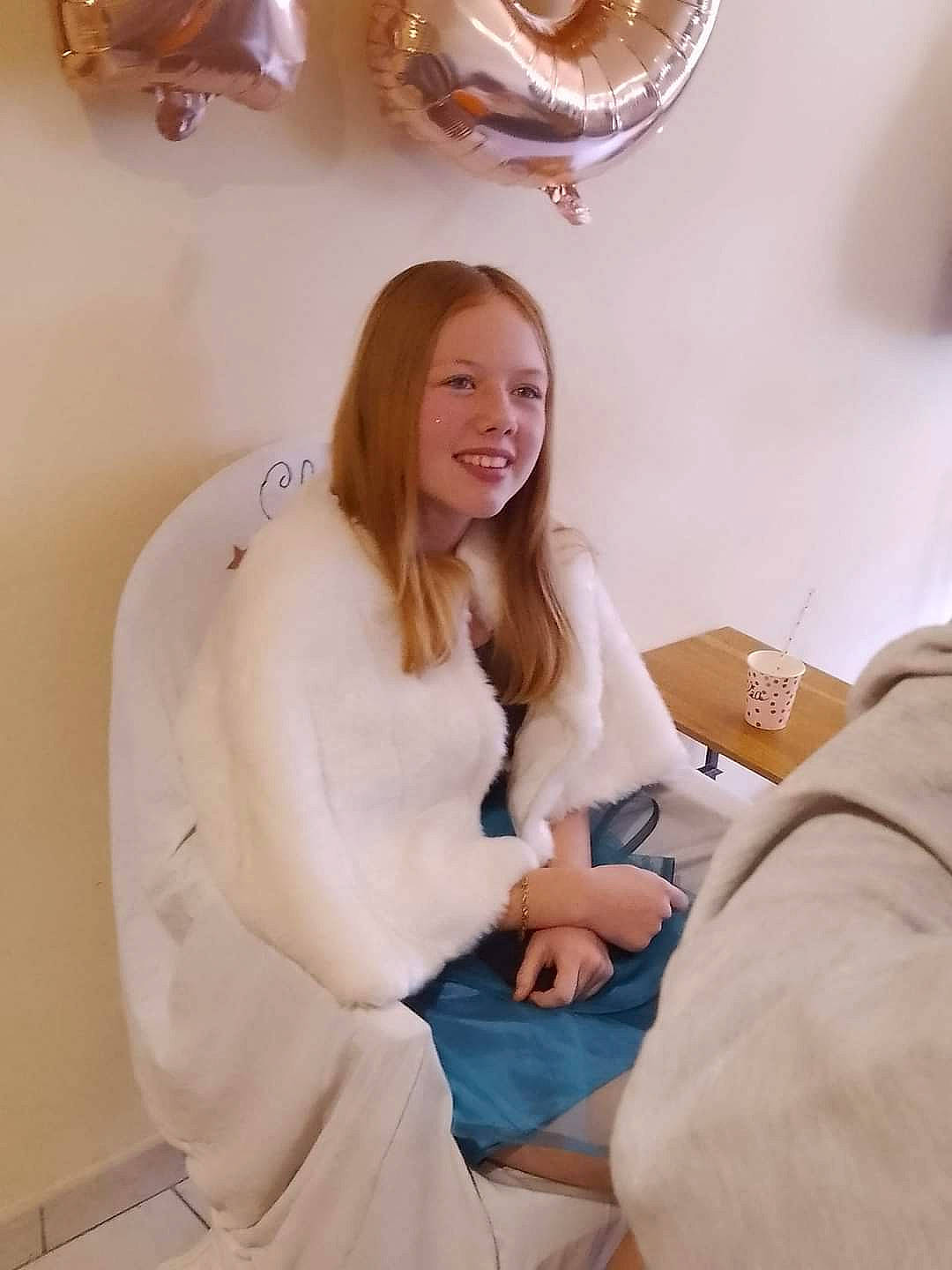 Clea participe au concours pour gagner de l'argent avec cette photo : ceiling, chair, comfort, dress, event, fashion_design, formal_wear, fun, fur, gown, happy, human_leg, jewellery, joy, linens, long_hair, person, room, sitting, sleeve