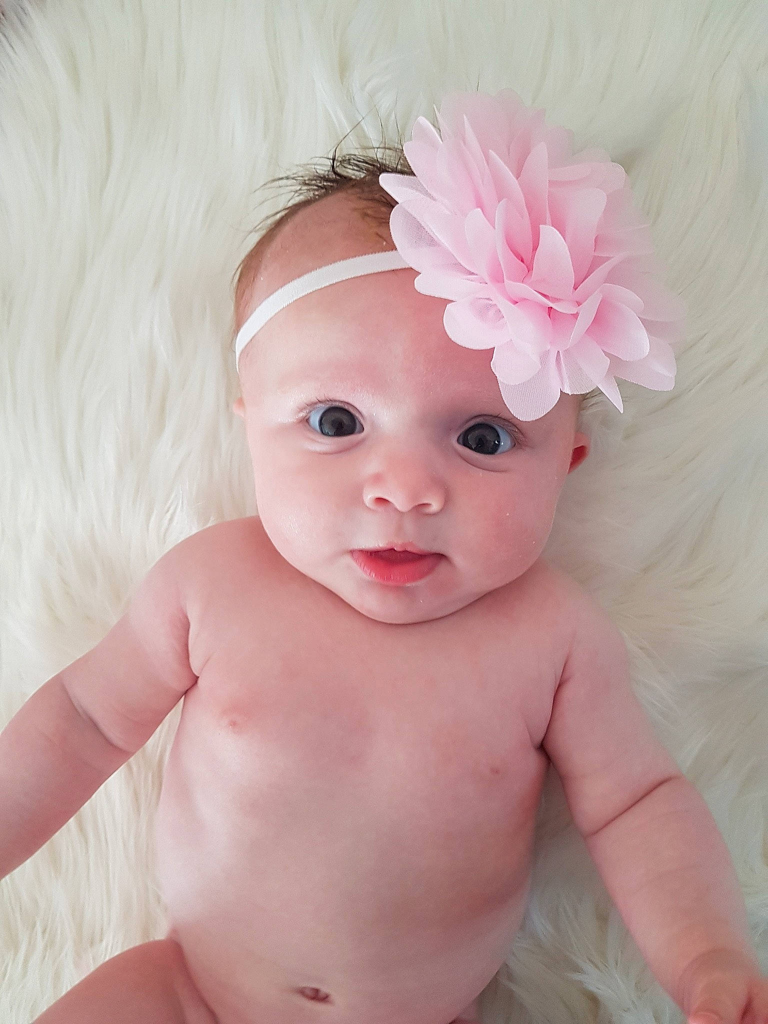 Tahlia a rejoint le concours — aidez-le/la à gagner de superbes lots ! baby, baby_bloomers, baby_products, baby_toddler_clothing, cheek, child, child_model, costume_accessory, face, fashion_accessory, hair_accessory, head, headband, headgear, headpiece, headwear, person, pink, product, skin