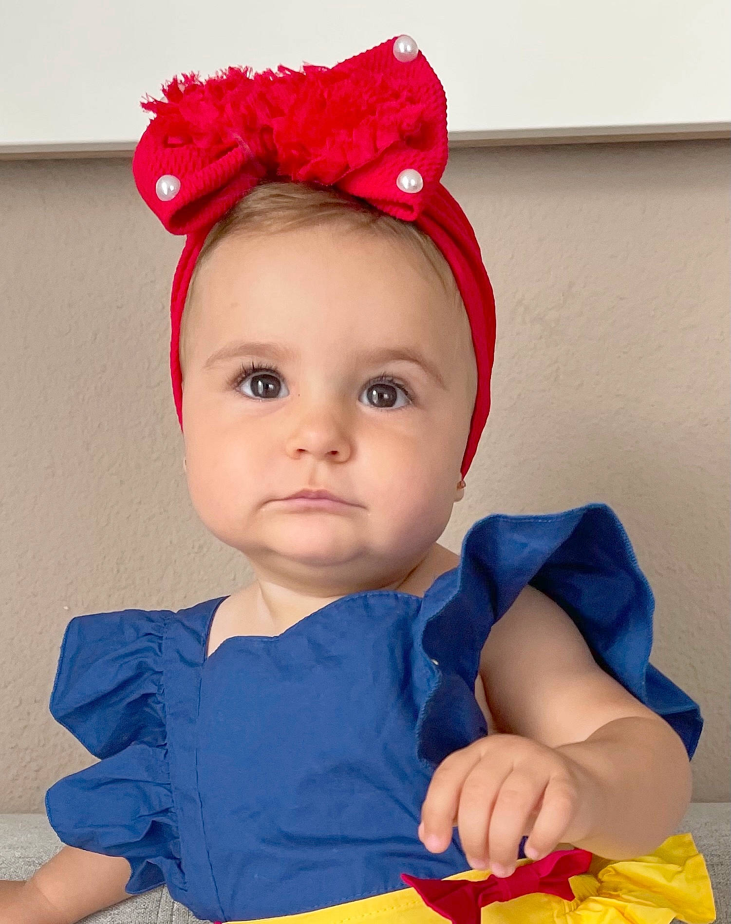 Lou a rejoint le concours — aidez-le/la à gagner de superbes lots ! baby, baby_toddler_clothing, cap, cheek, child, chin, clothing, costume_hat, face, head, headgear, lip, person, pink, product, red, sleeve, textile, toddler, white