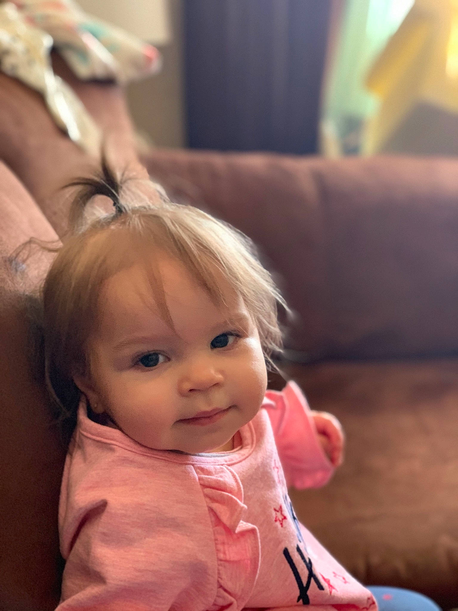 Melodi is registered to the contest to win money with this photo: baby, baby_toddler_clothing, cheek, child, comfort, couch, ear, event, eyelash, face, fun, happy, iris, lip, mammal, nose, person, sitting, skin, smile