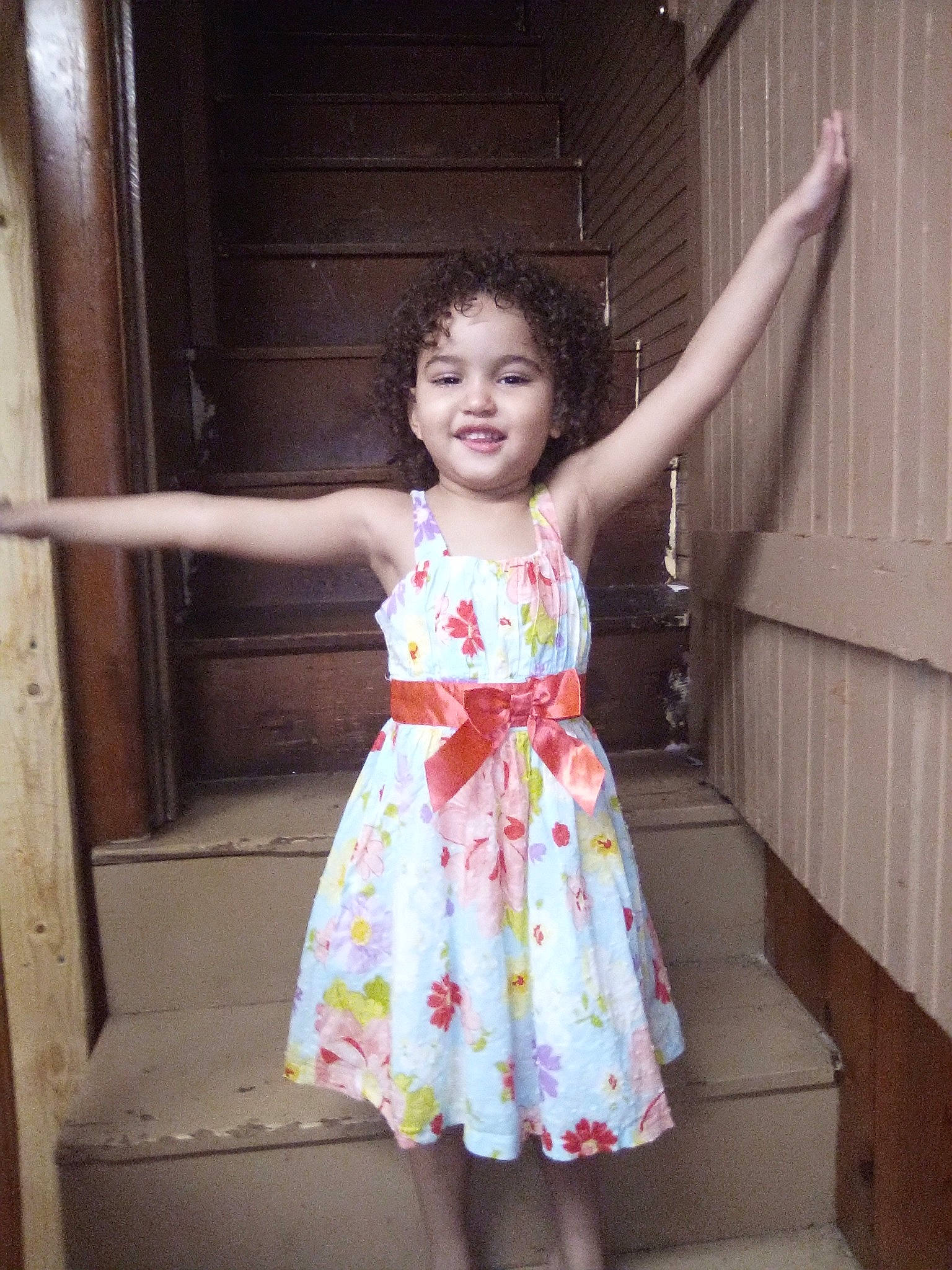 Aniah is registered to the contest to win money with this photo: child, child_model, clothing, day_dress, dress, joy, pattern, person, pink, smile, standing, toddler