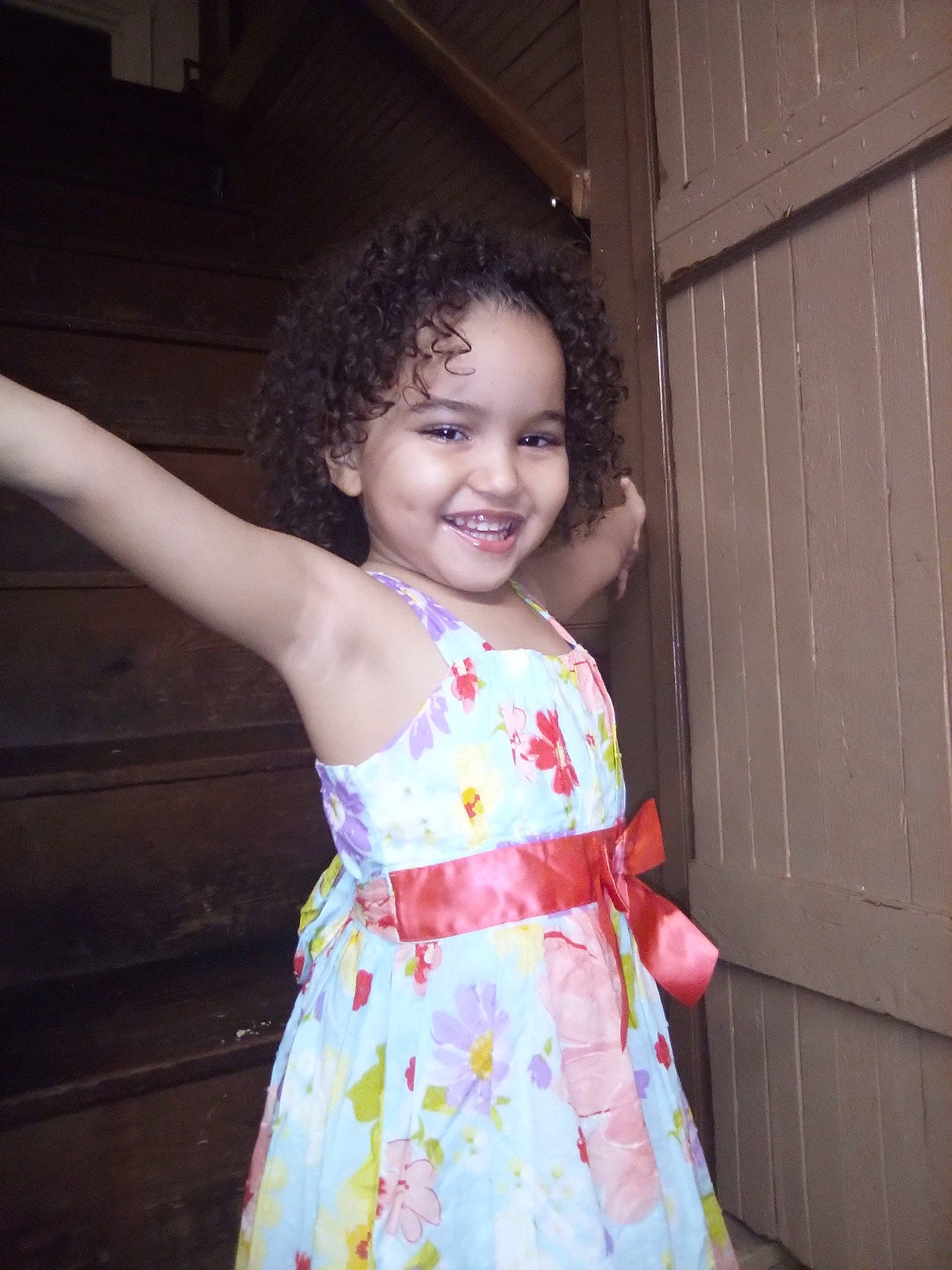 Aniah is registered to the contest to win money with this photo: child, dress, joy, pattern, person, smile, toddler