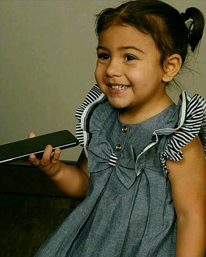 Tayla-lee is registered to the contest to win money with this photo: arm, ear, eyelash, facial_expression, finger, gesture, hand, happy, iris, joint, joy, neck, office_supplies, organ, person, shoulder, skin, sleeve, smile, standing