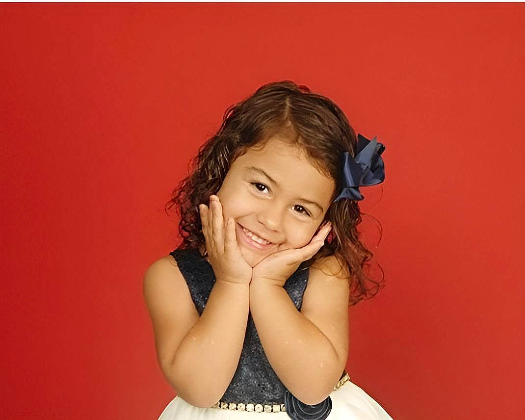 Tayla-lee joined the competition — help win amazing prizes! black_hair, brown_hair, cheek, child, elbow, eye, eyelash, flash_photography, fun, gesture, happy, joy, lip, long_hair, magenta, neck, person, sitting, sleeve, smile