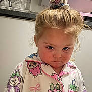 Danziell joined the competition — help win amazing prizes! child, girl, pajamas, hair_tie, serious_expression, face, indoor, kitchen, tile, countertop, cabinet, clothing, cute_pattern, portrait, standing, person, hair, young_child, home, scrunchie