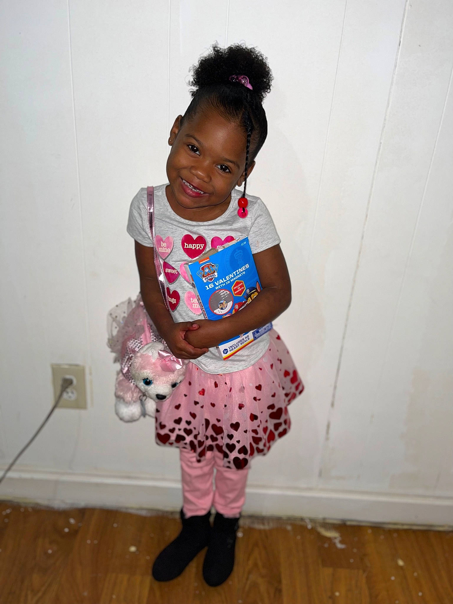 Jyani is registered to the contest to win money with this photo: baby_toddler_clothing, face, fashion_design, flooring, hair, happy, hardwood, human_leg, joy, knee, magenta, neck, pattern, person, pink, sleeve, smile, sock, t_shirt, thigh